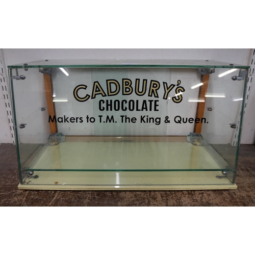 262 - A display cabinet bearing Cadbury's inscription