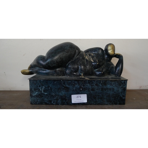 271 - A Surrealist style bronze figure of a reclining female