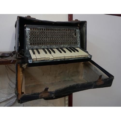 272 - A cased Barcarole accordion, cased