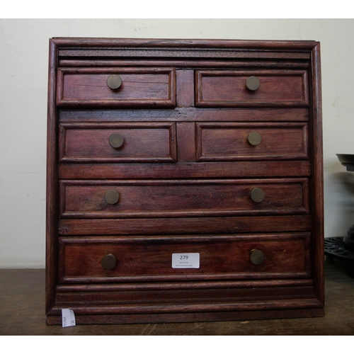 279 - A mahogany collectors cabinet