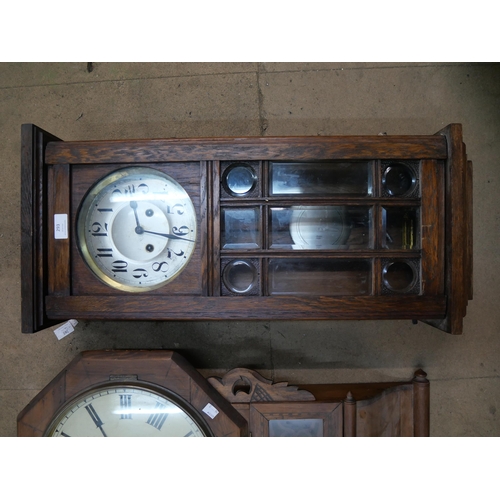 293 - A Victorian drop dial wall clock inscribed Thompson, Chesterfield wall clock and a George V oak wall... 