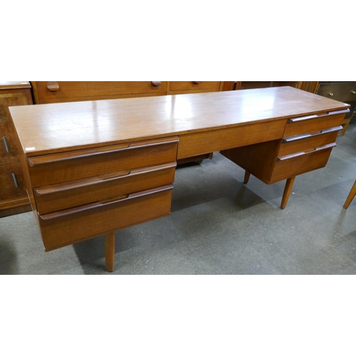 35 - An Avalon teak desk