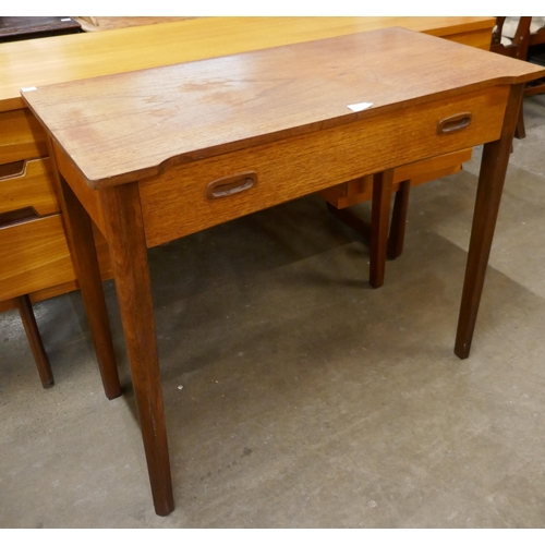44 - A Danish teak single drawer side table