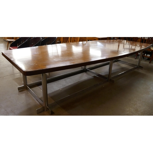 47 - A large teak and chrome dining table (351 x 139cms)