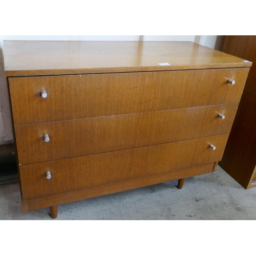 5 - A teak chest of drawers