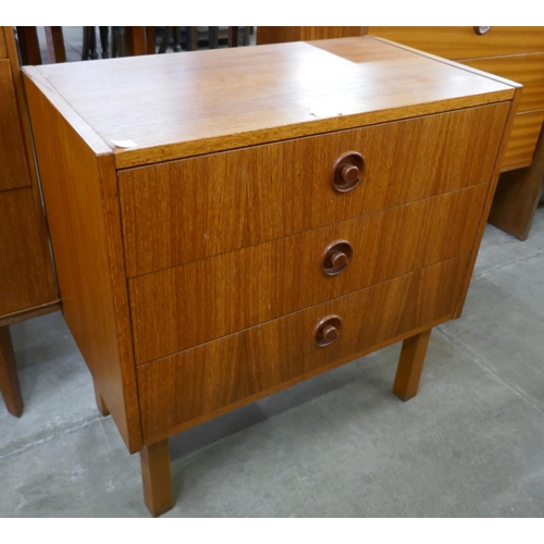54 - A small Danish three drawer chest