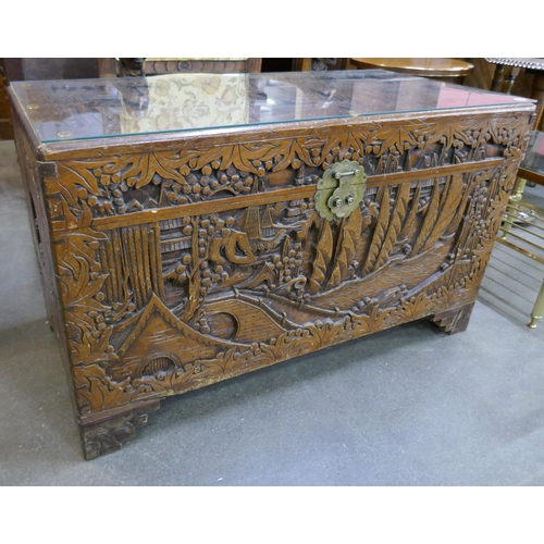 80 - A Chinese carved camphorwood chest