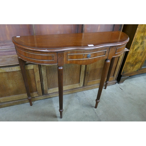 94 - An inlaid mahogany console table