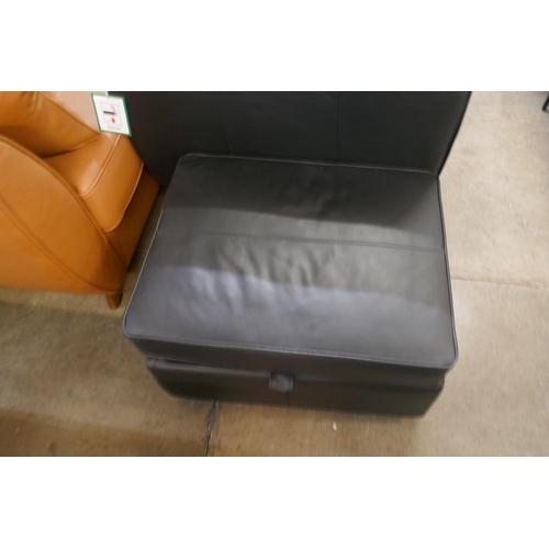 1307 - A black leather Hoxton two seater sofa and footstool RRP £2499