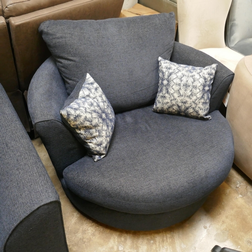 1399 - A blue upholstered three seater sofa, swivel armchair and footstool