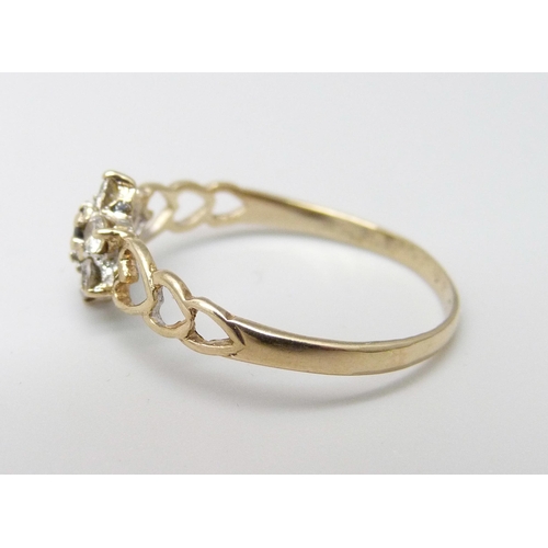 1024 - A 9ct gold, sapphire and white stone ring, 1.3g, R