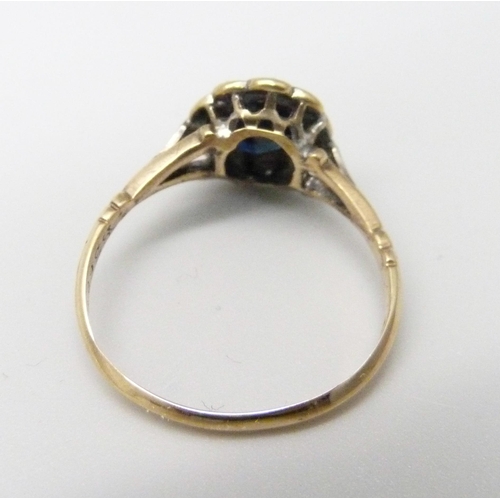 1027 - An 18ct gold, sapphire and diamond cluster ring, 2.5g, O