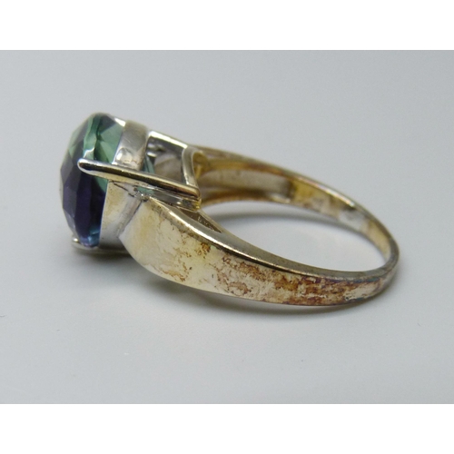 1037 - A silver gilt, colour change fluorite ring, maker TGGC, R