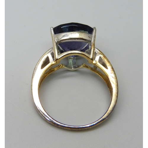 1037 - A silver gilt, colour change fluorite ring, maker TGGC, R