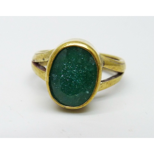 1038 - An emerald ring with certificate, 6.25 carat emerald, ring size O