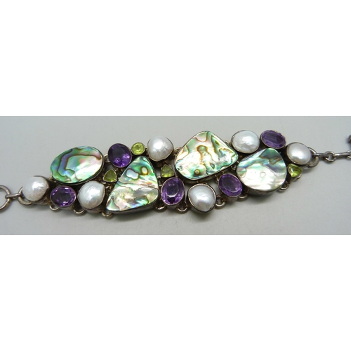 1054 - A silver, mother of pearl and amethyst bracelet, continental control mark