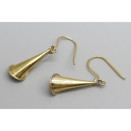 1074 - A pair of silver gilt and amber drop earrings