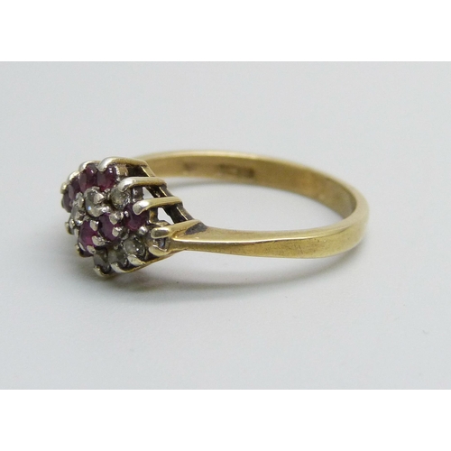 1078 - A silver gilt, ruby and white topaz ring, L/M