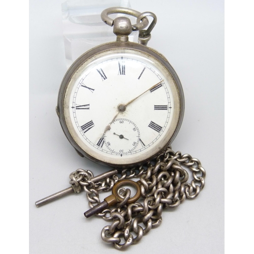 1097 - A silver Waltham pocket watch and a silver Albert chain