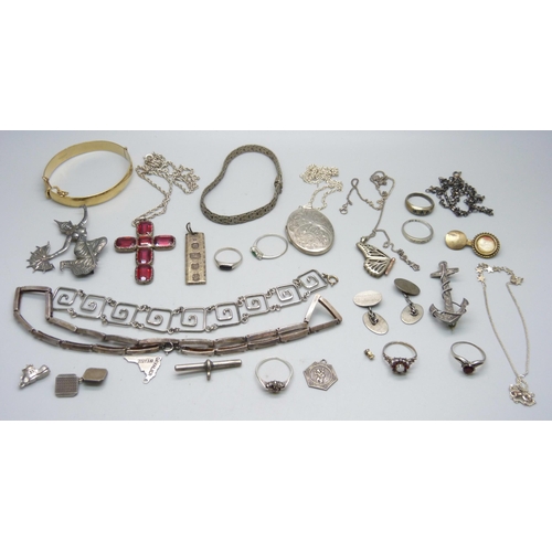 1106 - A collection of silver jewellery, etc., including a Victorian silver anchor brooch, large silver loc... 