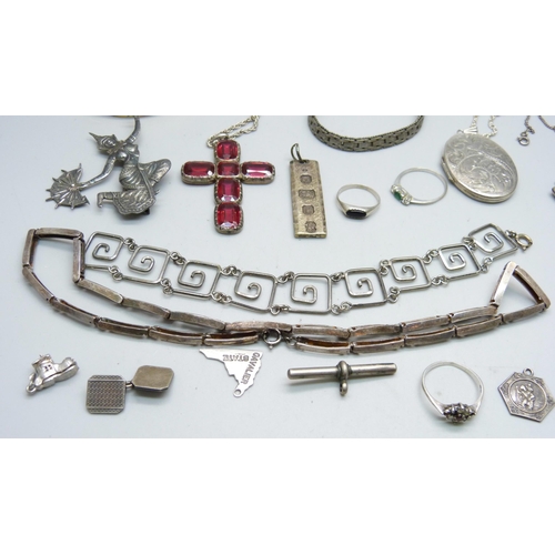 1106 - A collection of silver jewellery, etc., including a Victorian silver anchor brooch, large silver loc... 