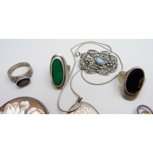 1116 - A silver locket and chain, six silver rings, etc., and a 935 silver fob watch