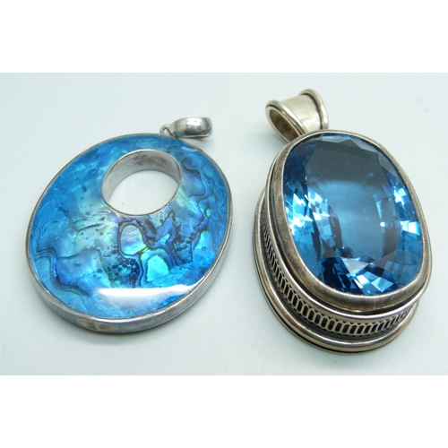 1119 - A large 925 silver mounted double sided pendant and one other large pendant set with a faceted blue ... 