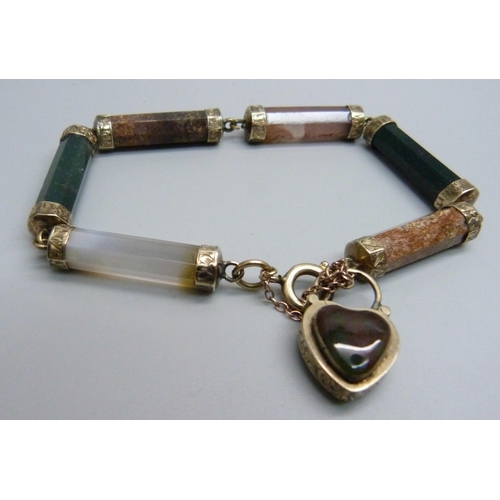 1132 - A Scottish yellow metal bracelet set with agate, bloodstone and quartz, tests as 9ct gold