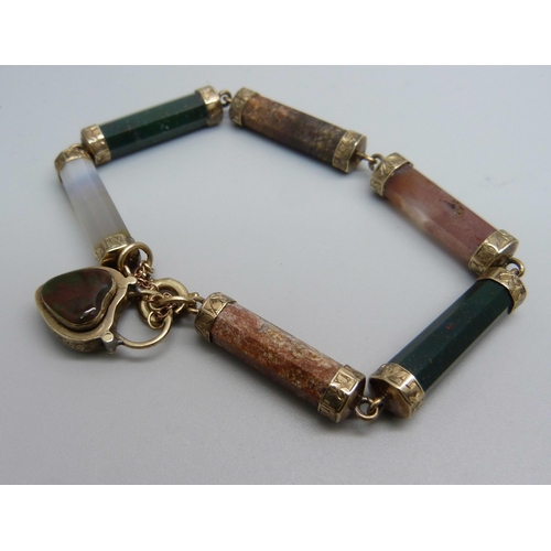 1132 - A Scottish yellow metal bracelet set with agate, bloodstone and quartz, tests as 9ct gold