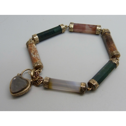 1132 - A Scottish yellow metal bracelet set with agate, bloodstone and quartz, tests as 9ct gold