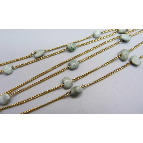 1133 - An 18ct gold and turquoise necklace, tests as 18ct gold, 22g, 109cm