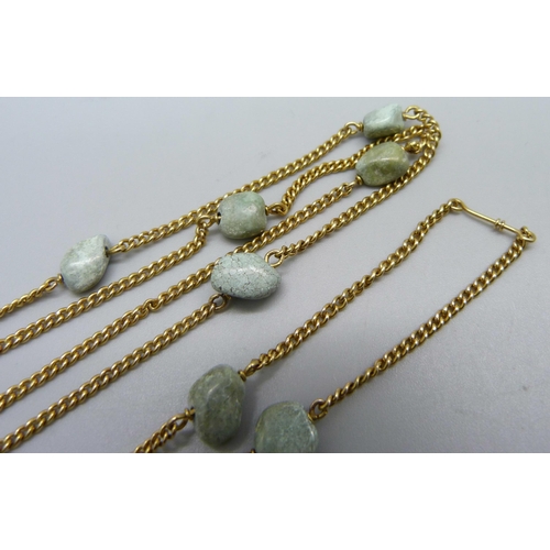 1133 - An 18ct gold and turquoise necklace, tests as 18ct gold, 22g, 109cm