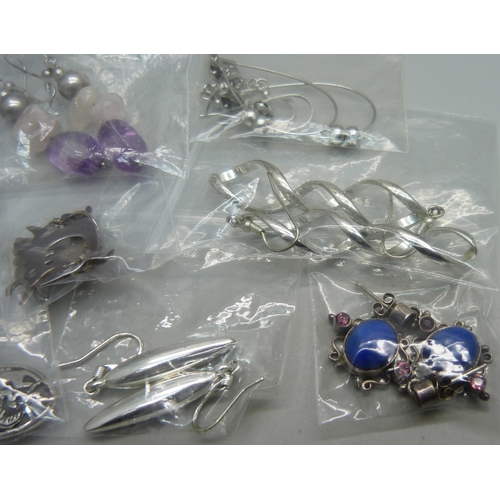 1142 - Eight pairs of silver drop earrings