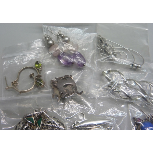 1142 - Eight pairs of silver drop earrings