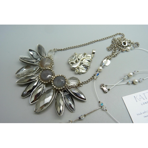 1160 - Two silver necklaces and a silver leaf pendant