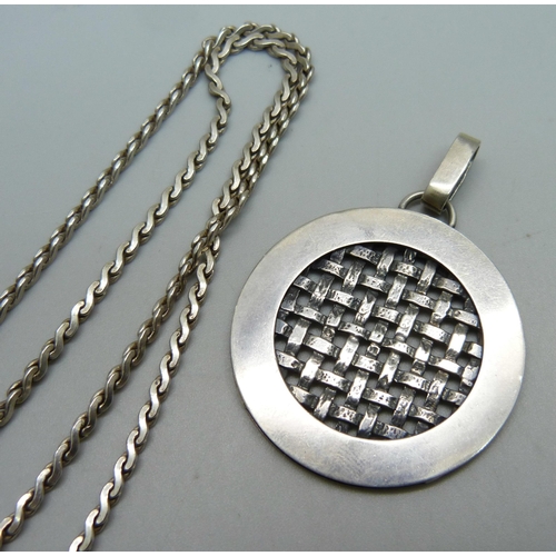 1161 - Two large silver pendants and a silver chain, 36g, chain 40cm