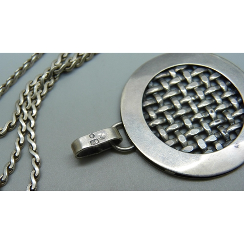 1161 - Two large silver pendants and a silver chain, 36g, chain 40cm