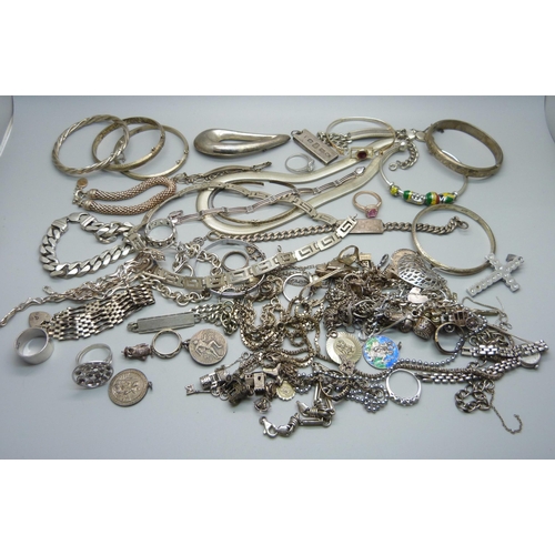 1164 - A large collection of silver jewellery, chains, rings, charm bracelet, bangles, charms, Pandora bang... 