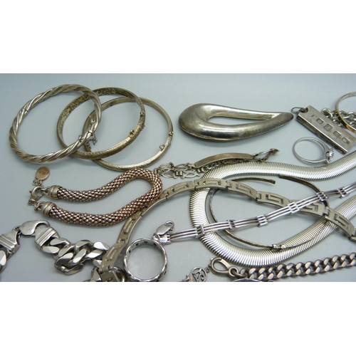 1164 - A large collection of silver jewellery, chains, rings, charm bracelet, bangles, charms, Pandora bang... 