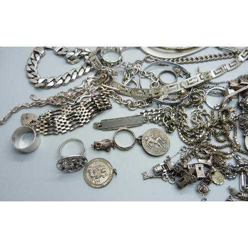 1164 - A large collection of silver jewellery, chains, rings, charm bracelet, bangles, charms, Pandora bang... 