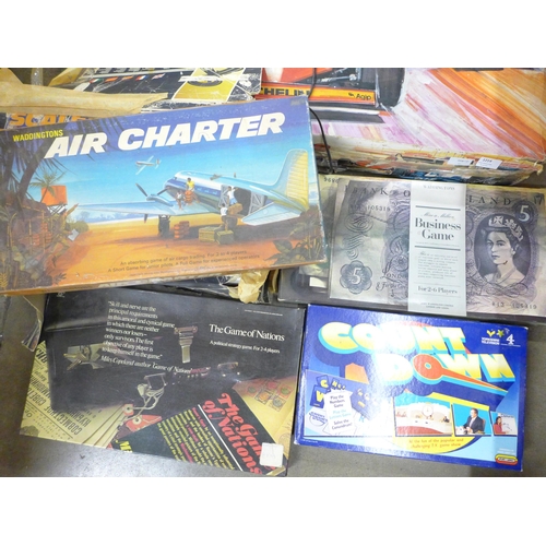 1214 - Two Scalextric sets, 500 and 200 and a collection of board games including Air Charter, The Game of ... 