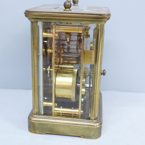 630 - A Matthew Norman brass and four glass sided carriage clock with alarm and repeater