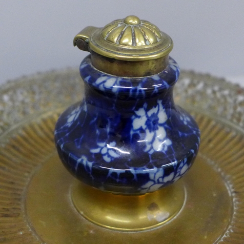 635 - A Victorian brass mounted inkstand on a pierced base