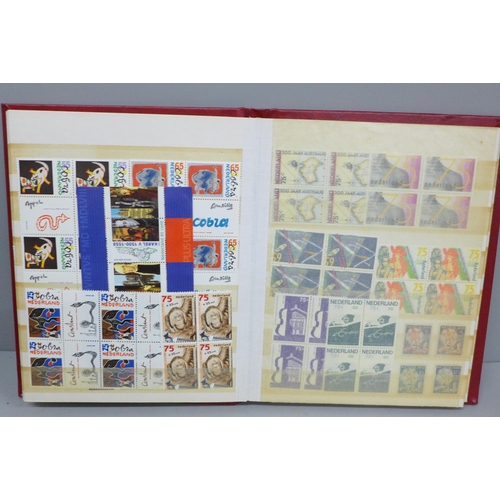 652 - Stamps; a stock book of mint Netherlands stamps, often in blocks of four, catalogues approximately £... 