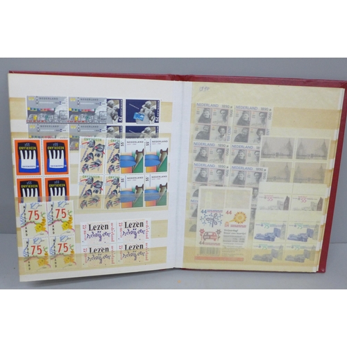 652 - Stamps; a stock book of mint Netherlands stamps, often in blocks of four, catalogues approximately £... 