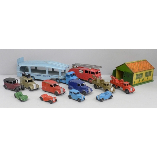 669 - A collection of vintage Dinky Toys die-cast model vehicles and Meccano tin plate garage