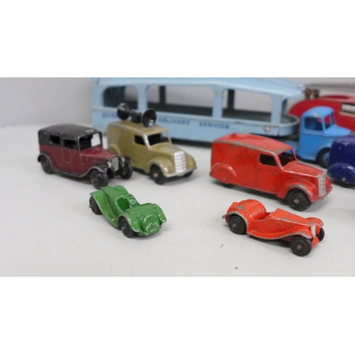 669 - A collection of vintage Dinky Toys die-cast model vehicles and Meccano tin plate garage