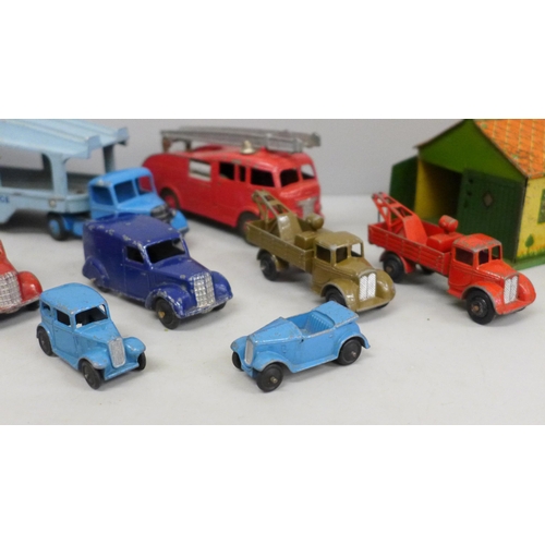 669 - A collection of vintage Dinky Toys die-cast model vehicles and Meccano tin plate garage