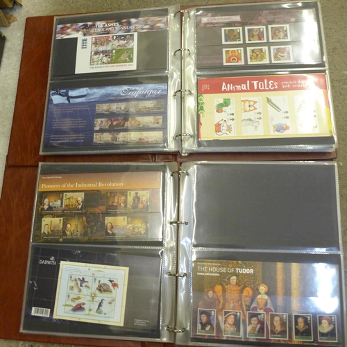 678 - Great Britain; 2004-2011 commemorative presentation packs in two special Post Office albums, 110+ pa... 