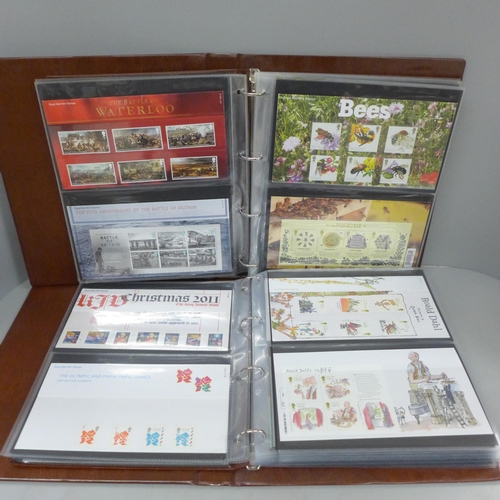 690 - Great Britain; 2011-2016 commemorative presentation packs in two special Post Office albums, 98 pack... 